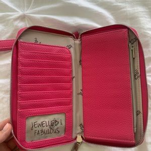 Never used, pink clutch